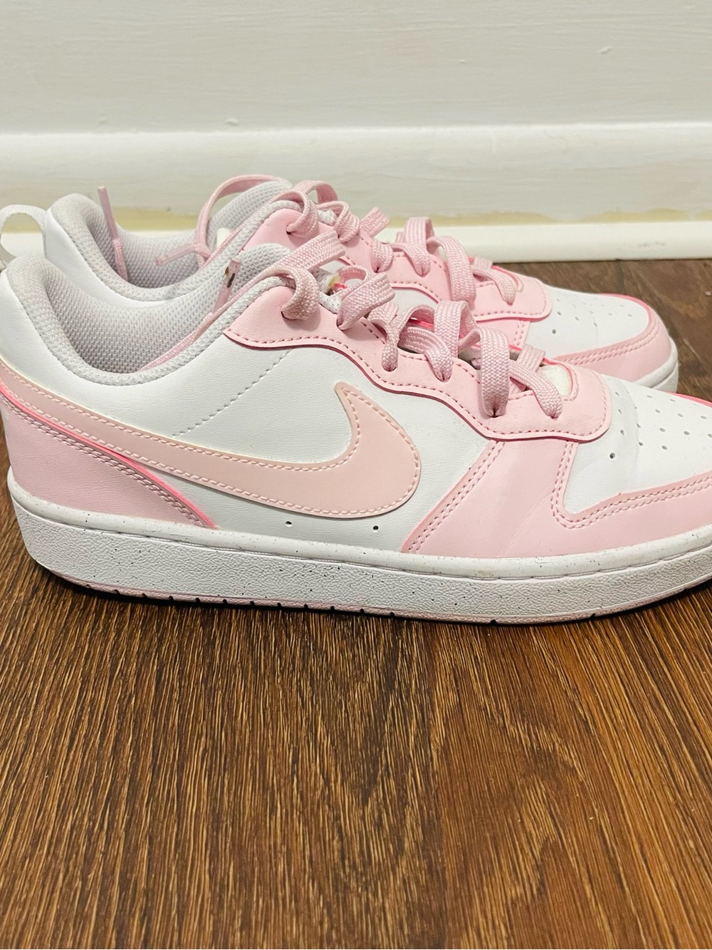 Nike Kids Pink and White Low-Top Sneakers with Swoosh